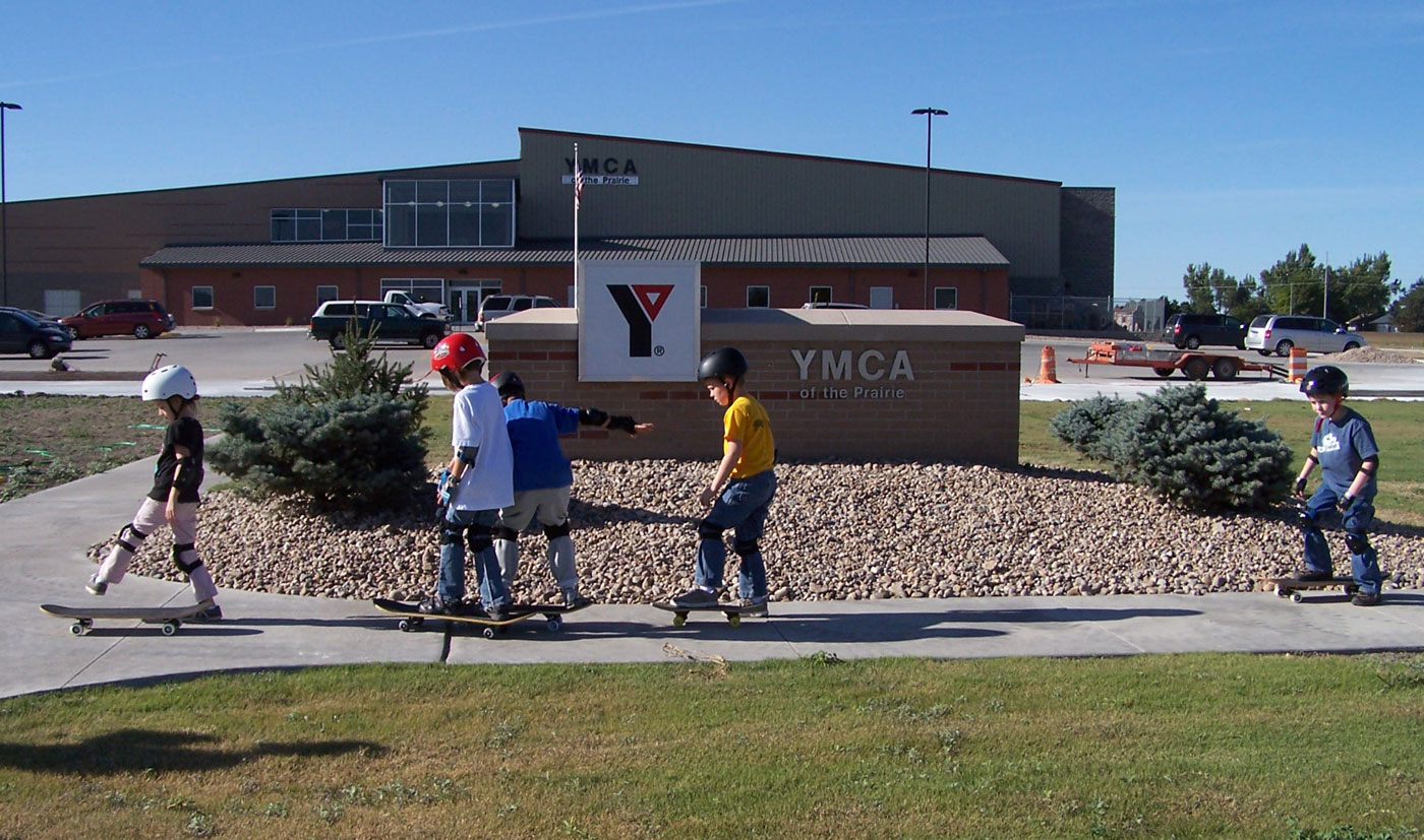 Children in front of YMCA sign